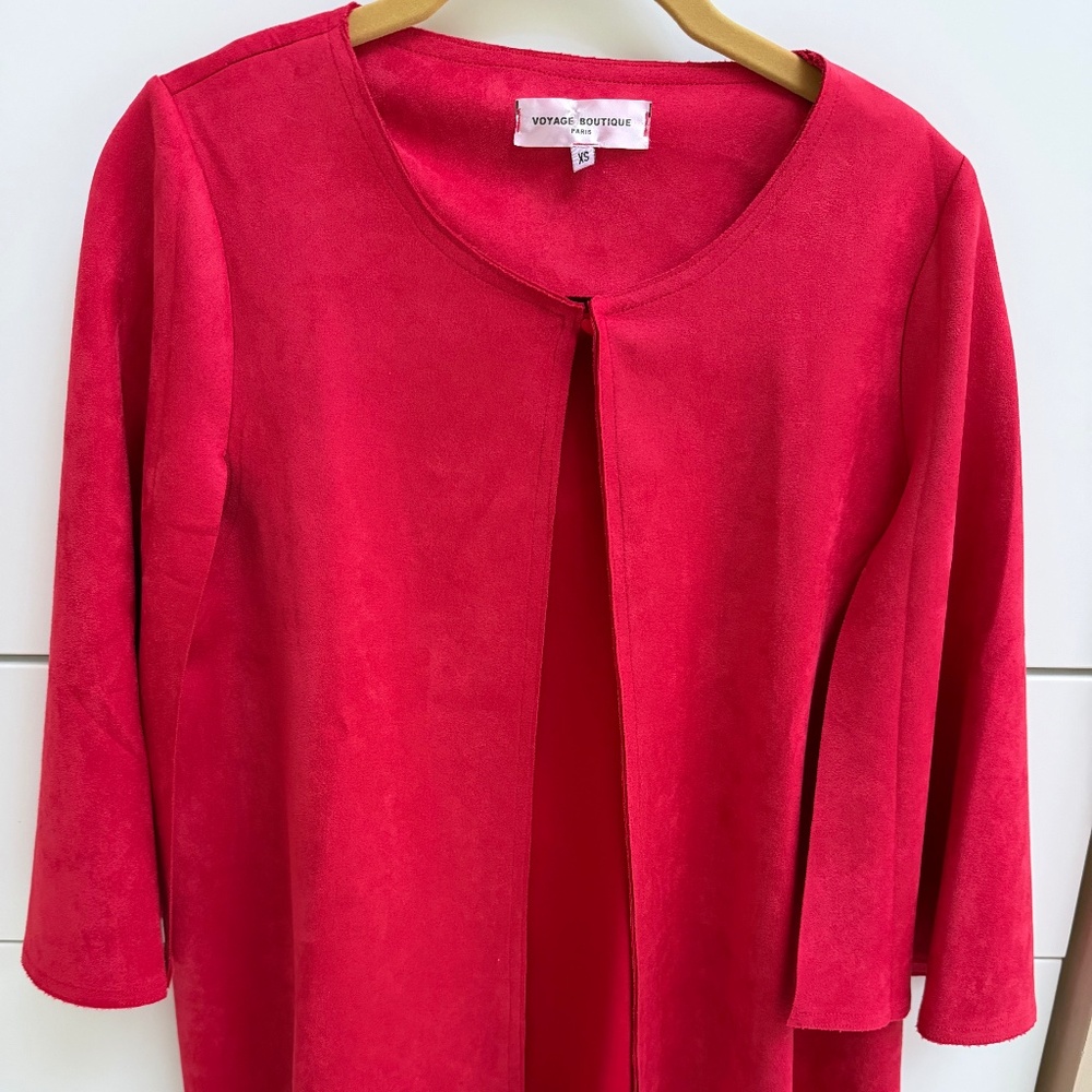 Pink jacket, XS. Feels like suede but is 90% polyester, 10% elasthanne